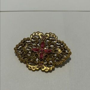 Vintage gold colored filigree with pink gems -Brooch